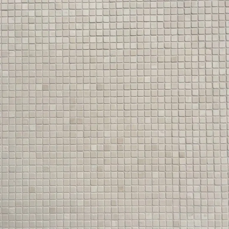 tumlad mosaik i ljus kalksten