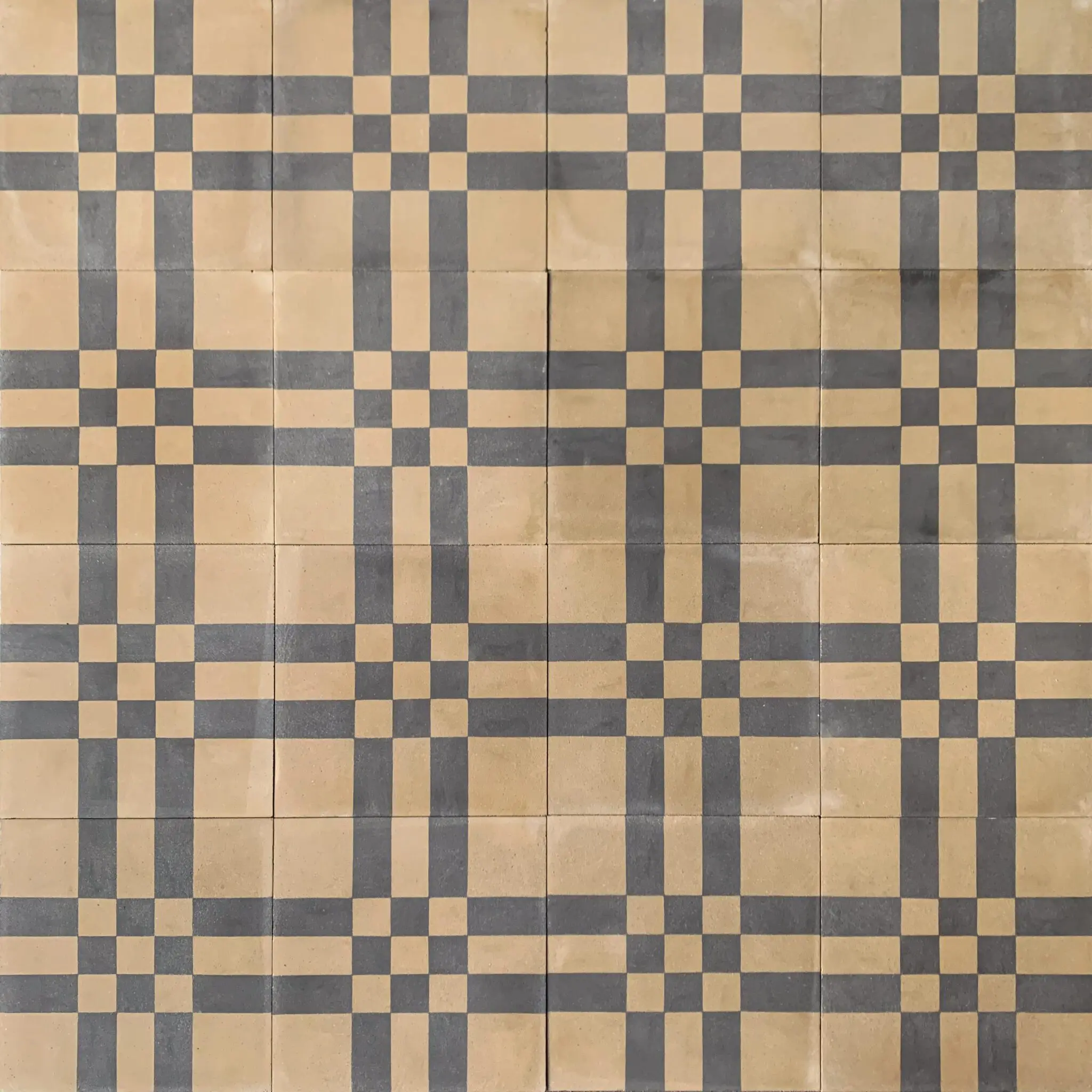 mönstrat cementgolv i svart och grönt