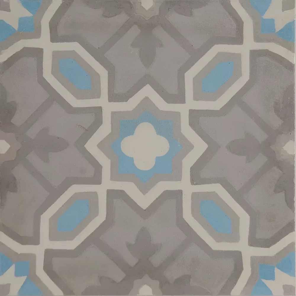 mönstrad cementplatta i grått, blått och vitt
