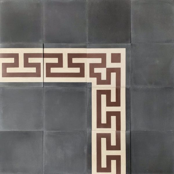 mönstrat cementgolv i kräm, rött och svart