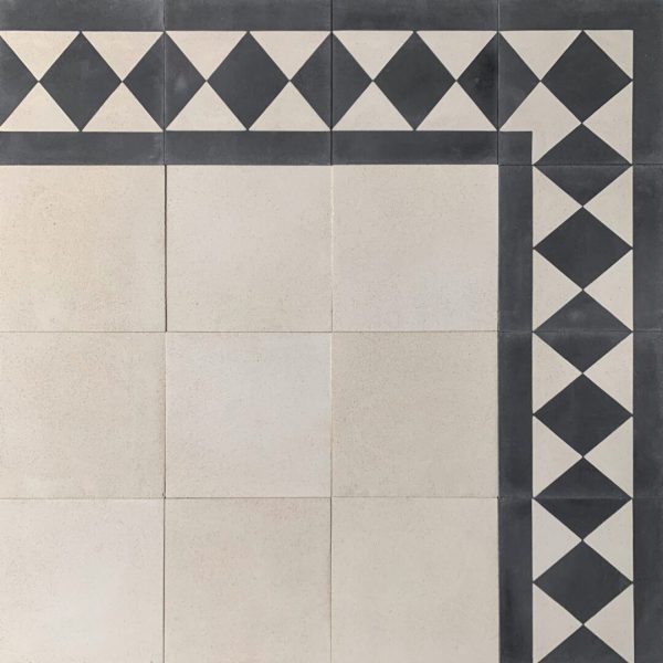 cementgolv i vitt med mönstrad ram