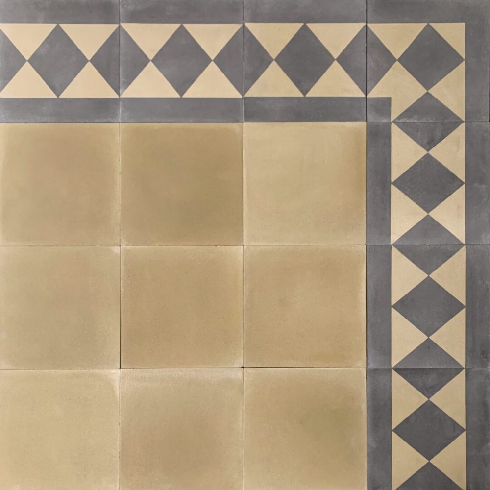 mönstrat cementgolv i svart och grönt