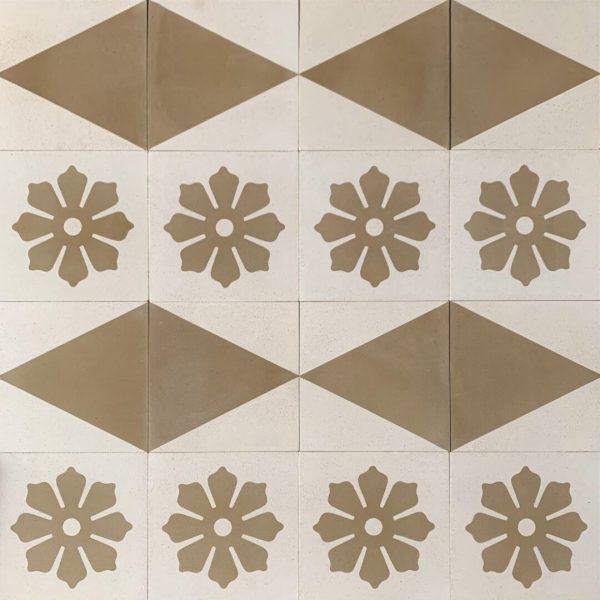 cementgolv med romber och blommor i vitt och grönt