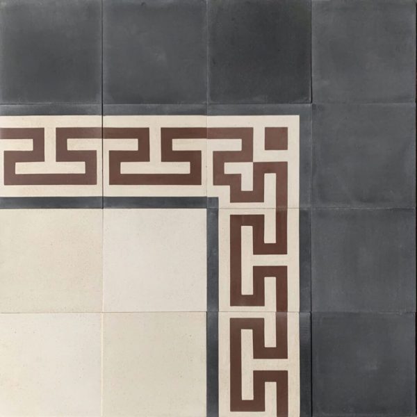 cementgolv med bårder i rommersk stil i vitt, svart och rött