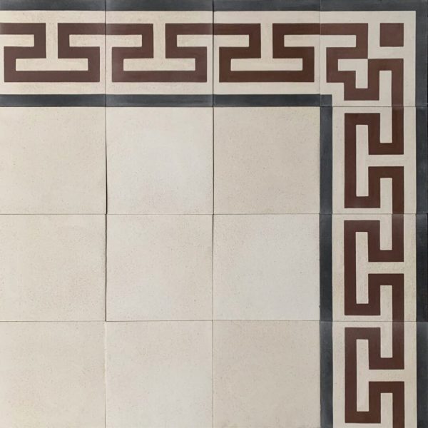 mönstrat cementgolv i kräm, rött och svart