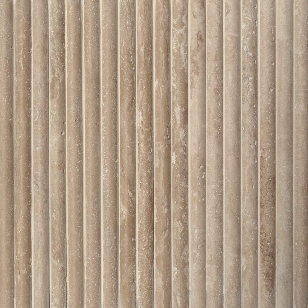 stavar av beige travertin