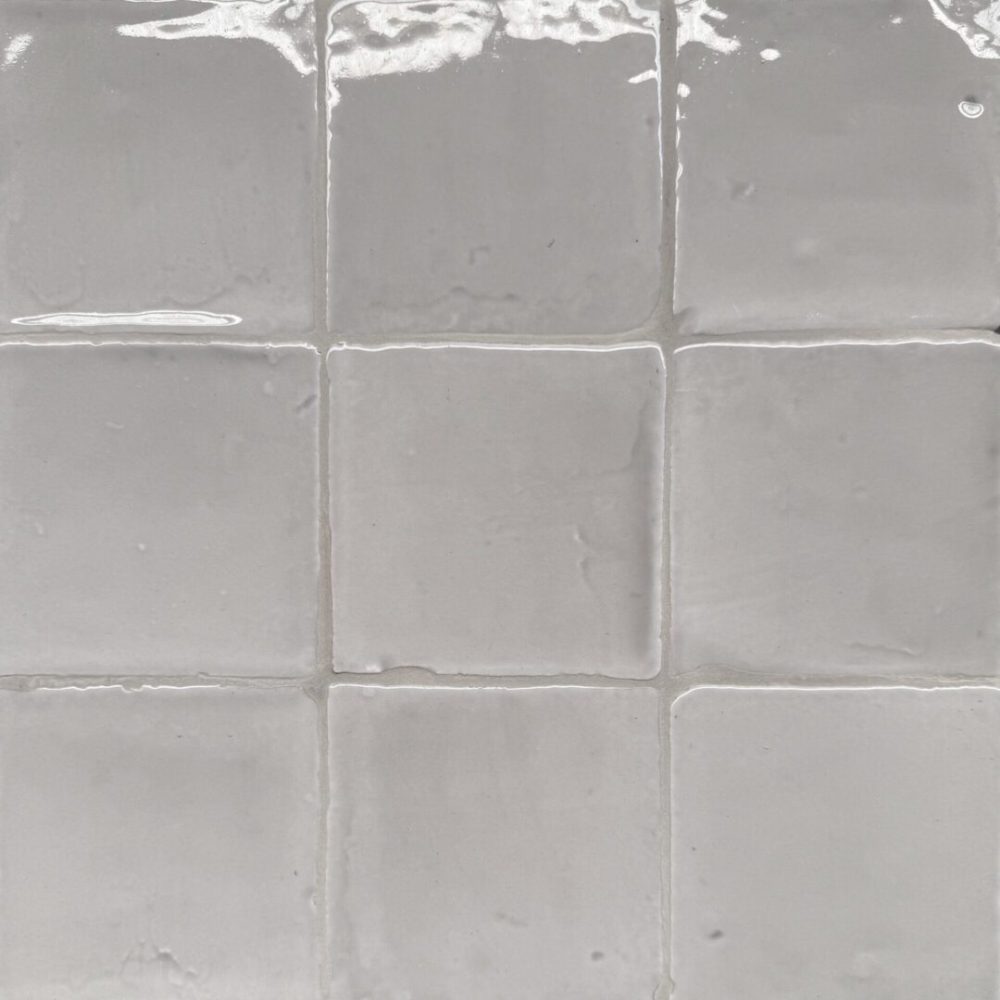 grått handgjort kakel på vägg