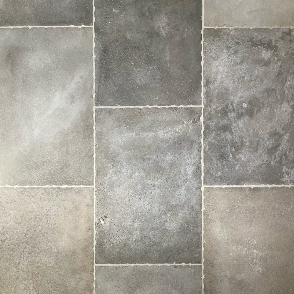 limestone flooring in tones of grey and beige