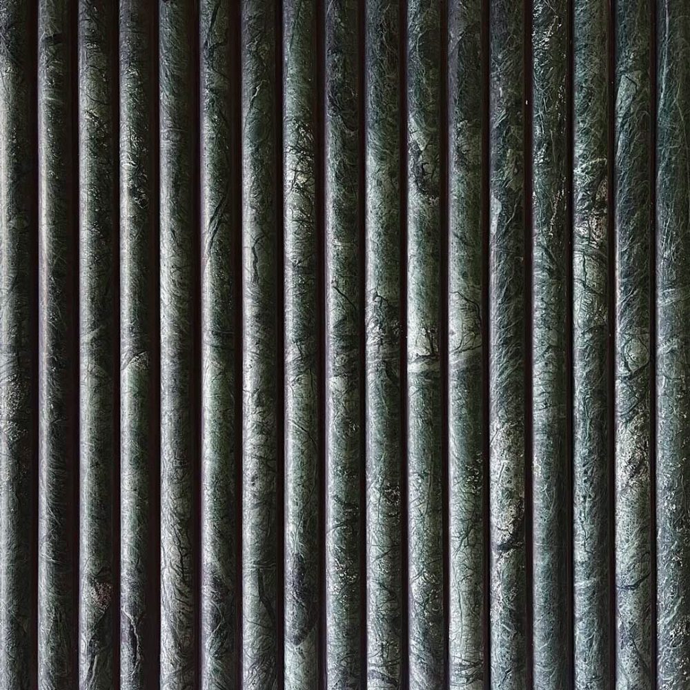 grön marmor i rundade stavar