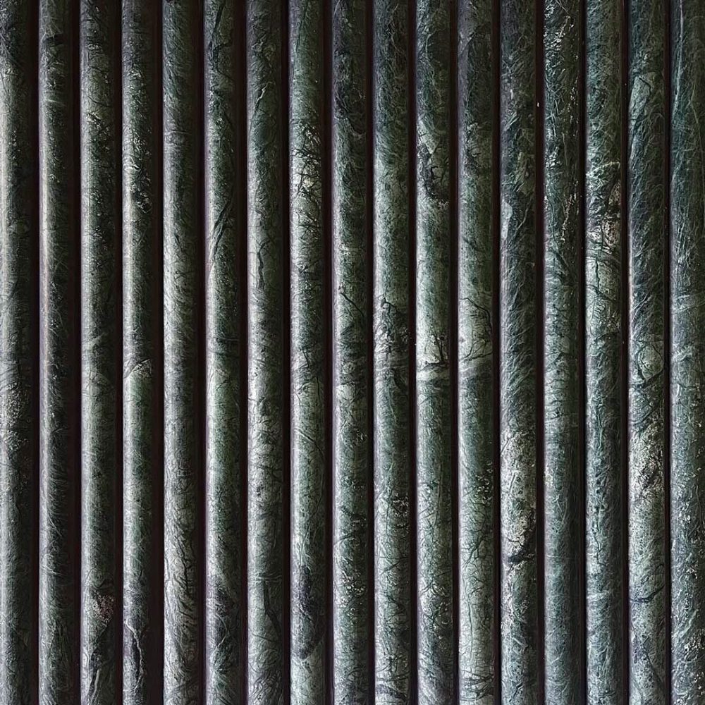 grön marmor i rundade stavar