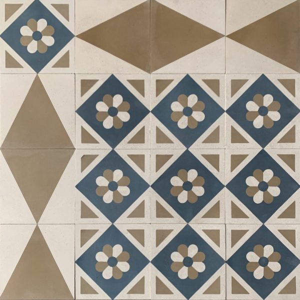 cementgolv i geometriskt mönster med blommor i blått, vitt och olivgrönt