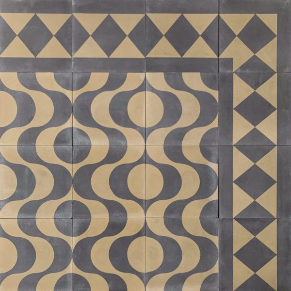 mönstrat cementgolv i olivgrönt och svart