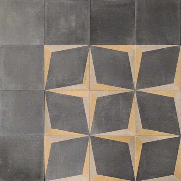 mönstrat cementgolv i form av stjärnor i svart, grått och guld