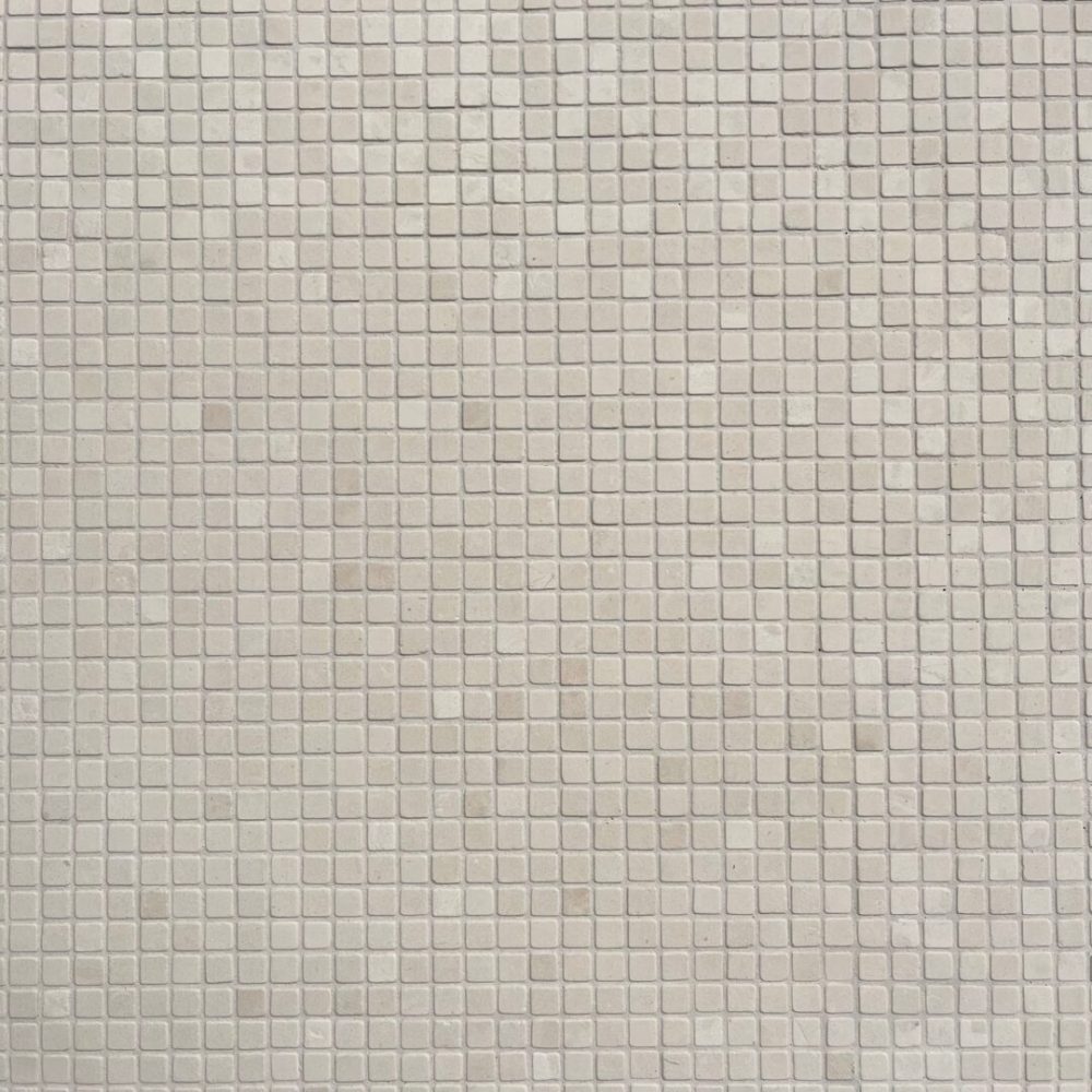 tumlad mosaik i ljus kalksten