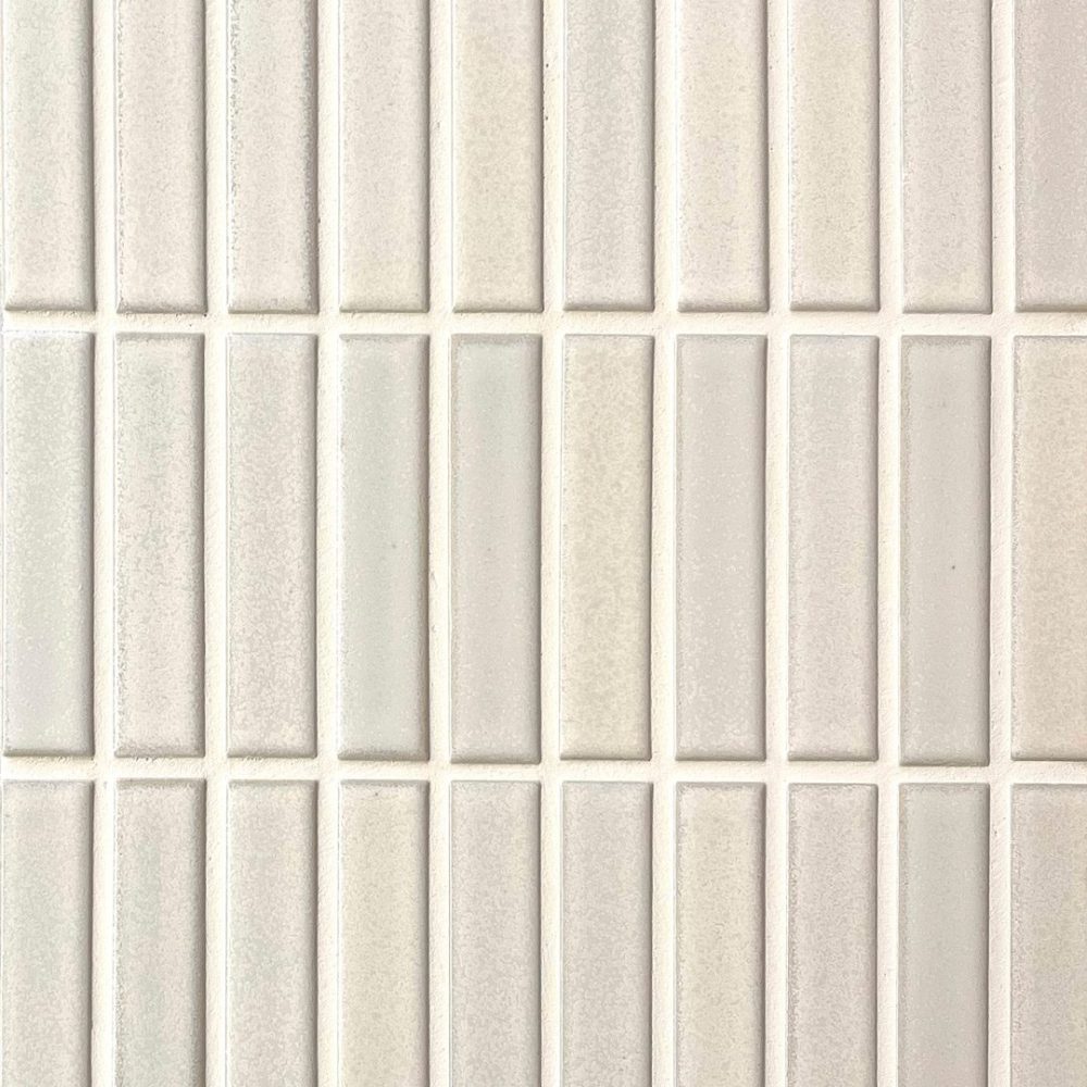 krämfärgad avlång japansk mosaik i keramik