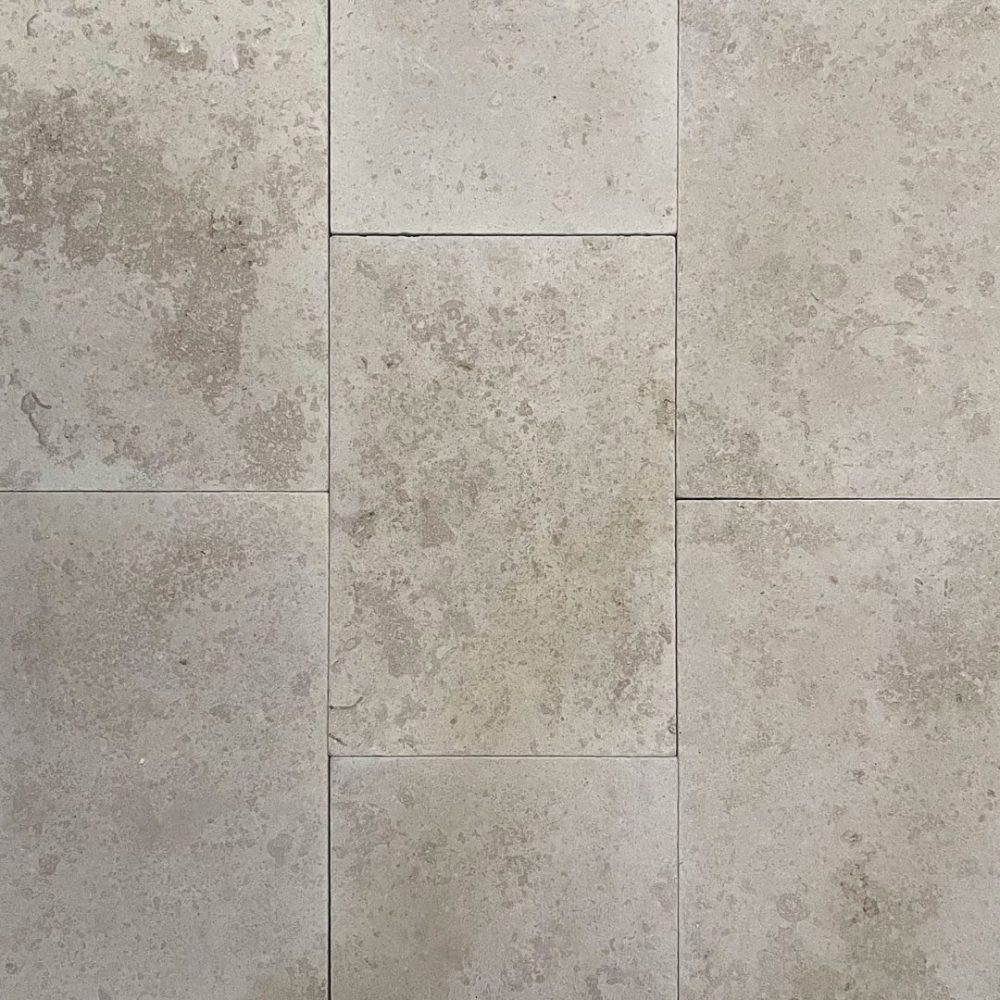 tumlad kalksten golv